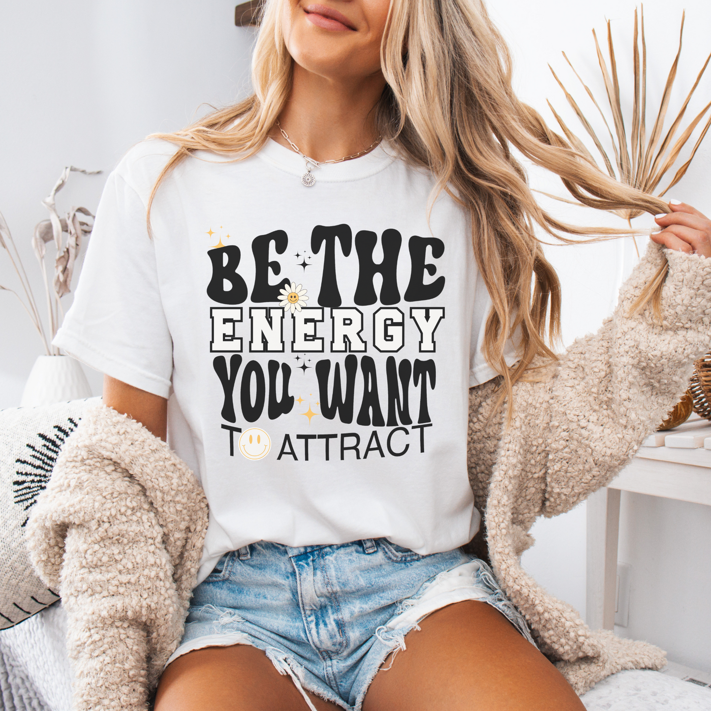 Be the energy you want to attract, women's graphic tee